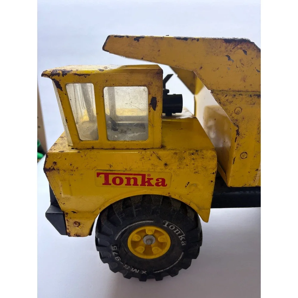 Vintage 1970s Mighty Tonka Dump Truck XMB-975 Pressed Steel Yellow Heavy Duty